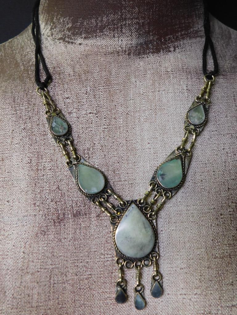 JADE TEARDROP STYLE NECKLACE ROCK STONE LAPIDARY SPECIMEN: JADE TEARDROP STYLE NECKLACE ROCK STONE LAPIDARY SPECIMEN — Part of our Discover Vintage Vault, Crystals and Gems auction at HATMAN'S Auctions! Please see photos for measurements and condition.