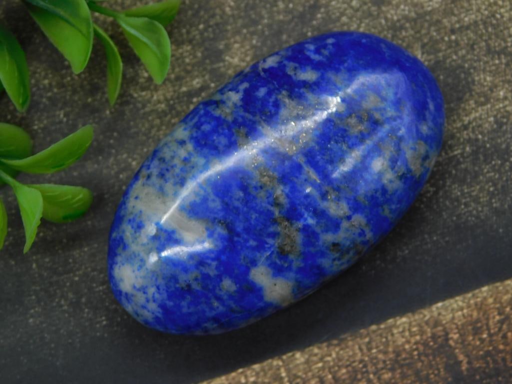LAPIS LAZULI PALM STONE ROCK STONE LAPIDARY SPECIMEN: LAPIS LAZULI PALM STONE ROCK STONE LAPIDARY SPECIMEN — Part of our Discover Vintage Vault, Crystals and Gems auction at HATMAN'S Auctions! Please see photos for measurements and condition. YES, we