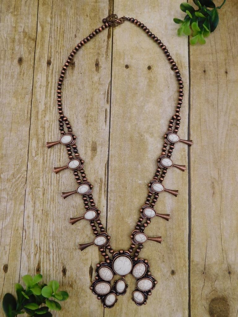 COSTUME JEWELRY SQUASH BLOSSOM NECKLACE: COSTUME JEWELRY SQUASH BLOSSOM NECKLACE - Part of our Discover Twilight Bazaar, Crystals and Gems auction at HATMAN'S Auctions! Please see photos for measurements and condition. YES, we have in-house