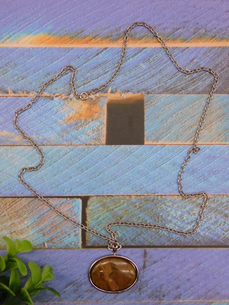 STONE PENDANT ON CHAIN NECKLACE ROCK STONE LAPIDARY SPECIMEN: STONE PENDANT ON CHAIN NECKLACE ROCK STONE LAPIDARY SPECIMEN - Part of our Discover Twilight Bazaar, Crystals and Gems auction at HATMAN'S Auctions! Please see photos for measurements and condition.