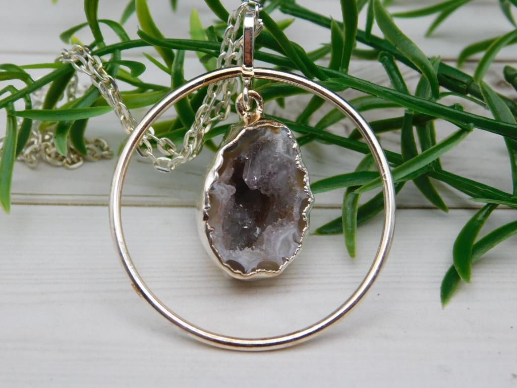 GEODE HALF PENDANT NECKLACE ROCK STONE LAPIDARY SPECIMEN: GEODE HALF PENDANT NECKLACE ROCK STONE LAPIDARY SPECIMEN - Part of our Discover Twilight Bazaar, Crystals and Gems auction at HATMAN'S Auctions! Please see photos for measurements and condition. YES, 