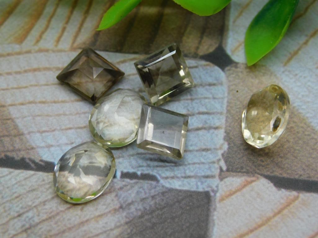 CITRINE FACETED TONE LOT ROCK STONE LAPIDARY SPECIMEN: MIXED GEMSTONE LOT ROCK STONE LAPIDARY SPECIMEN — Part of our Discover Curiosity Shop, Crystals and Gems auction at HATMAN'S Auctions! Please see photos for measurements and condition. YES, we have