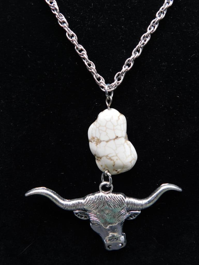 COW HEAD PENDANT WITH STONE ACCENT ON CHAIN NECKLACE: COW HEAD PENDANT WITH STONE ACCENT ON CHAIN NECKLACE — Part of our Discover Mystic Finds, Crystals and Gems auction at HATMAN'S Auctions! Please see photos for measurements and condition. YES, we