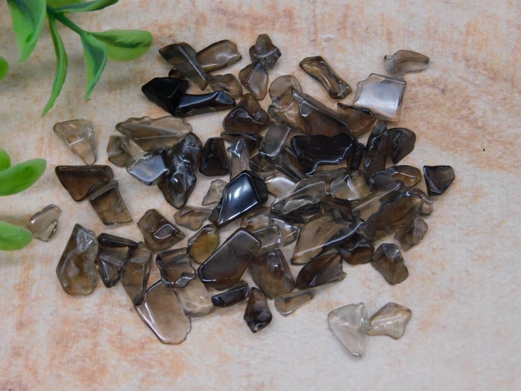 SMOKY QUARTZ CHIPS ROCK STONE LAPIDARY SPECIMEN: SMOKY QUARTZ CHIPS ROCK STONE LAPIDARY SPECIMEN - Part of our Discover Mystic Finds, Crystals and Gems auction at HATMAN'S Auctions! Please see photos for measurements and condition. YES, we have
