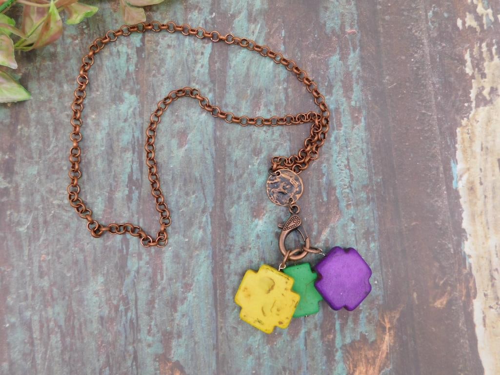 Copper-Tone Necklace with Colorful Pendant Charms: Copper-Tone Necklace with Colorful Pendant Charms - Part of our Discover Mystic Finds, Crystals and Gems auction at HATMAN'S Auctions! Please see photos for measurements and condition. YES, we have in
