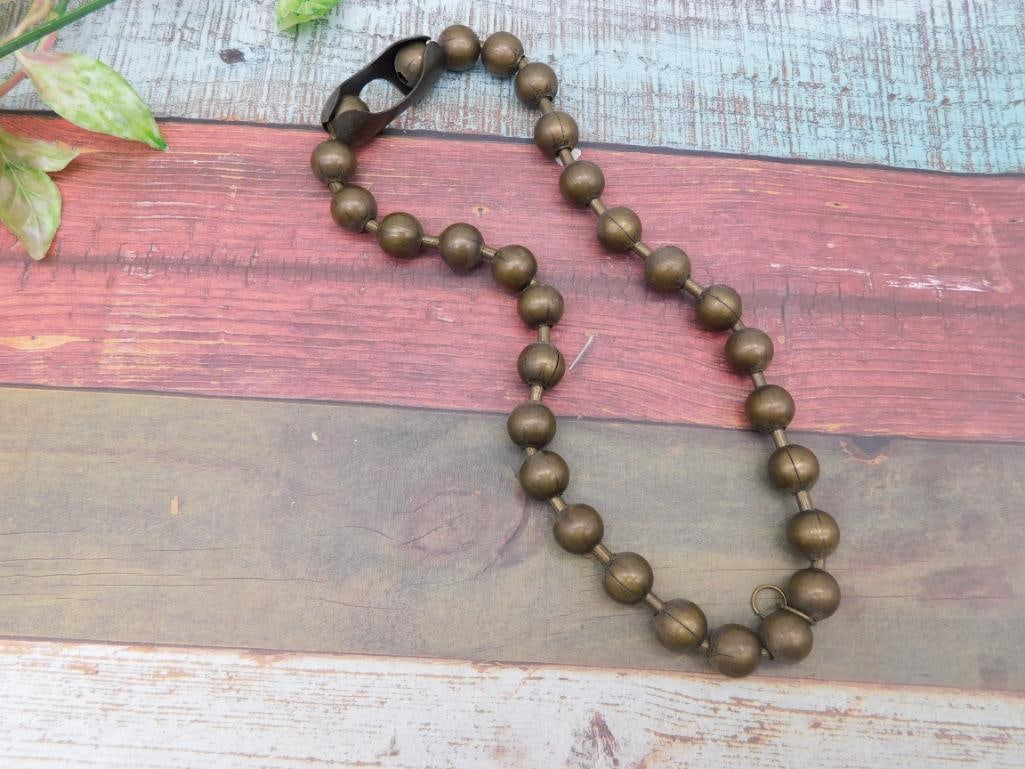 Strand of Brass-Tone Beads Necklace with Lobster Clasp: Strand Of Brass-Tone Beads Necklace With Lobster Clasp ? Authentic estate find offered in our online auction. Perfect for collectors, resellers, and enthusiasts of vintage, antiques, minerals, rocks, 