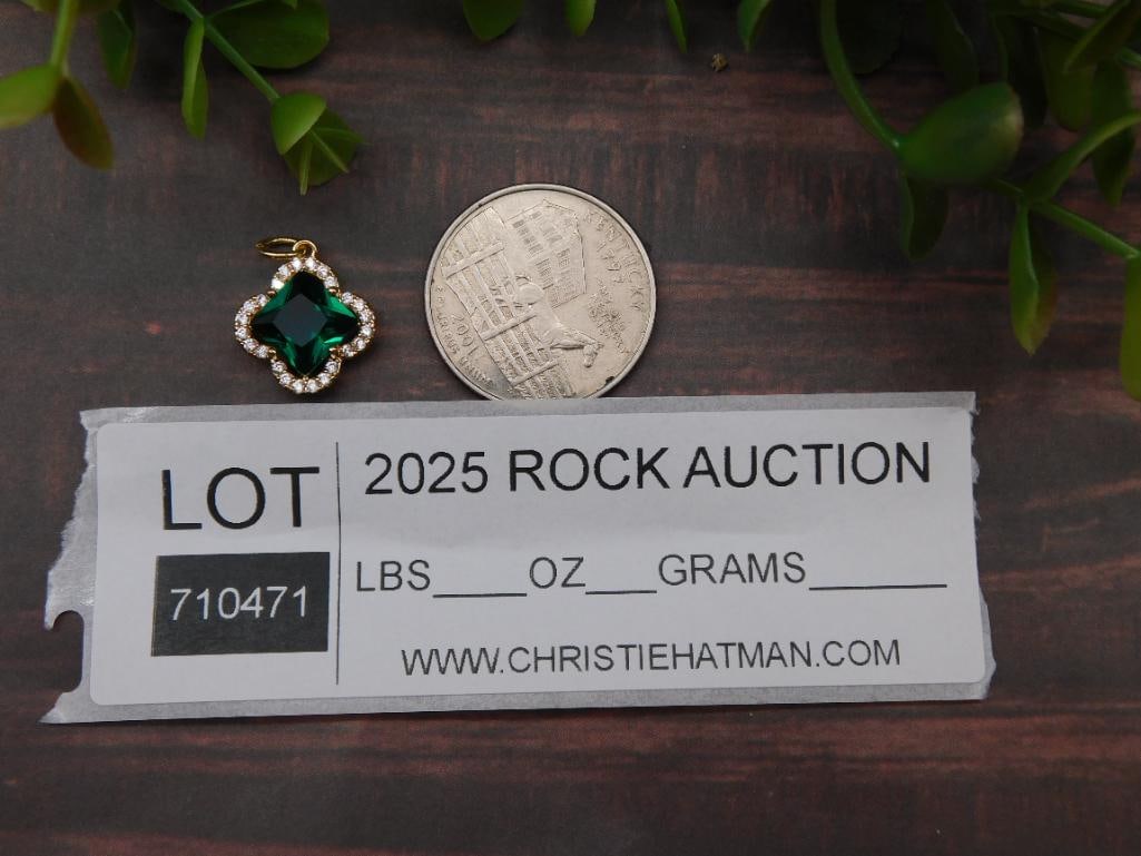 Gold-Tone Pendant With Green Stone and Clear Accents: Gold-Tone Pendant With Green Stone and Clear Accents - Part of our Discover Gilded Gallery, Crystals and Gems auction at HATMAN'S Auctions! Please see photos for measurements and condition. YES, we ha