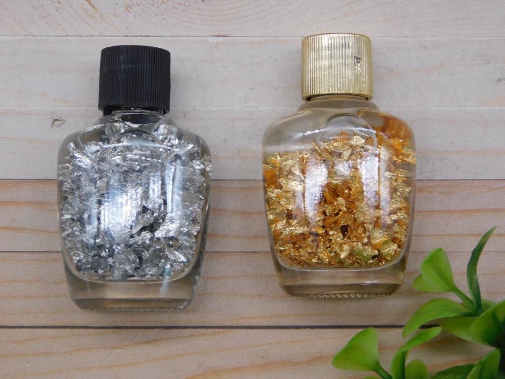 GOLD AND SILVER FLAKES IN BOTTLES ROCK STONE LAPIDARY SPECIMEN: GOLD AND SILVER FLAKES IN BOTTLES ROCK STONE LAPIDARY SPECIMEN - Part of our Discover Golden Attic, Crystals and Gems auction at HATMAN'S Auctions! Please see photos for measurements and condition.