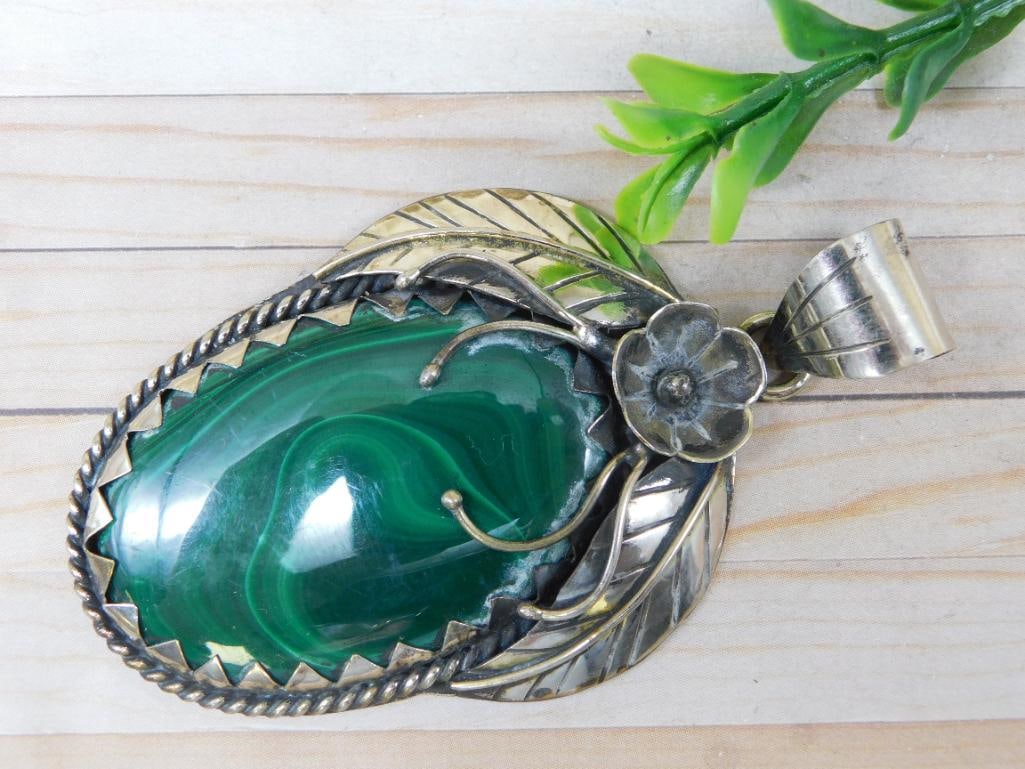 MALACHITE PENDANT WITH INTRICATE TOOLING ROCK STONE LAPIDARY SPECIMEN: WELCOME TO HATMAN AUCTIONS! SPECIAL NOTICE: Please see photos for measurements and descriptions. ***Yes, we have in house shipping with MANY REPEAT CUSTOMERS because of our streamlined service.