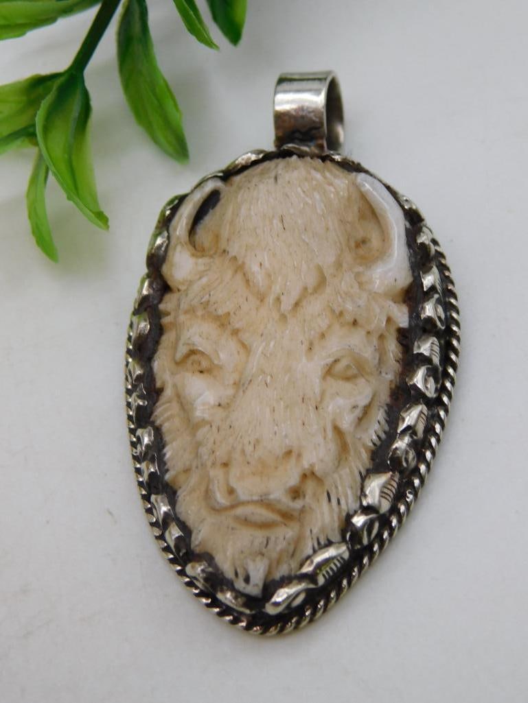 CARVED BONE BISON PENDANT ROCK STONE LAPIDARY SPECIMEN: WELCOME TO HATMAN AUCTIONS! SPECIAL NOTICE: Please see photos for measurements and descriptions. ***Yes, we have in house shipping with MANY REPEAT CUSTOMERS because of our streamlined service. ****We