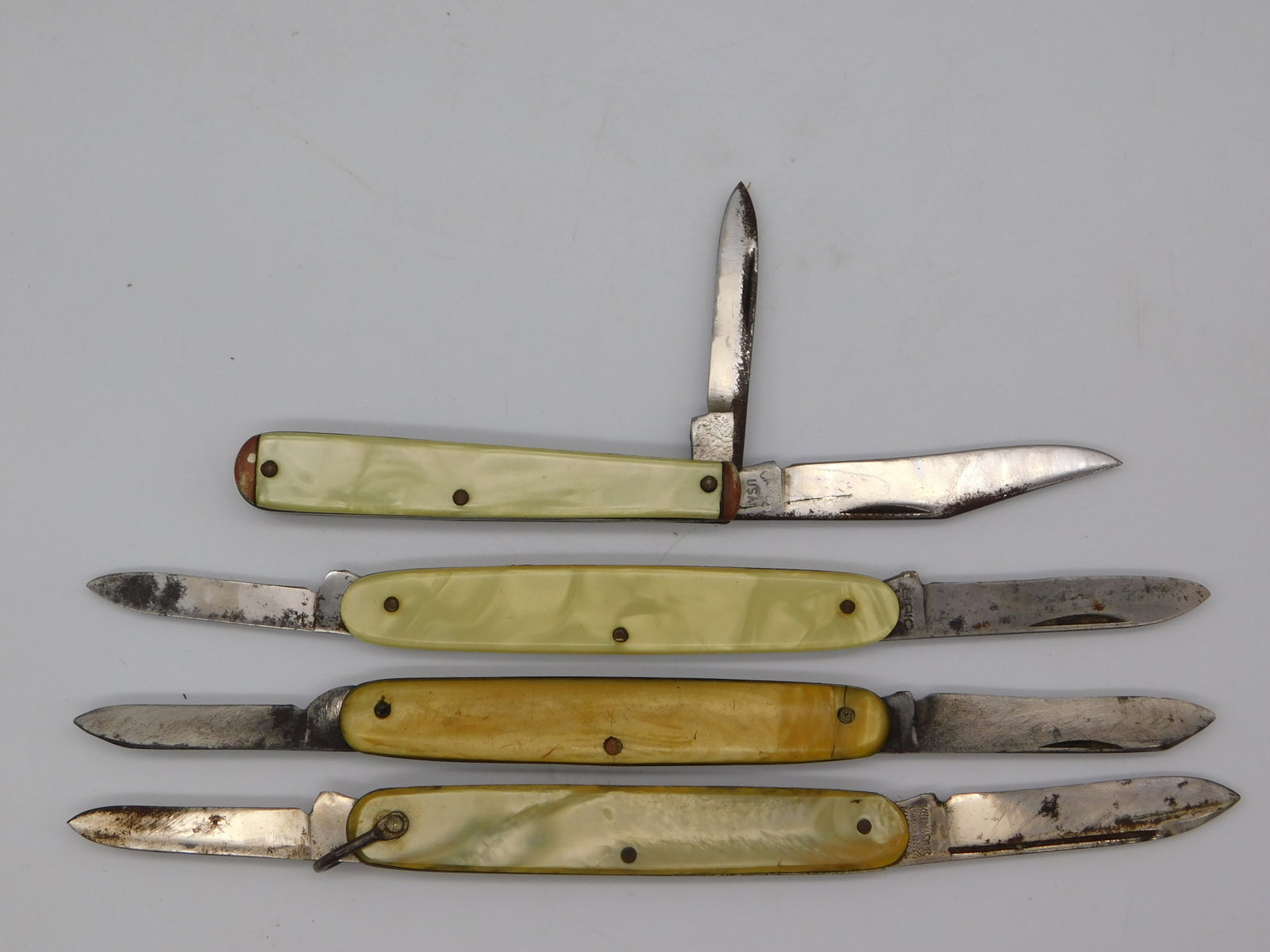 Vintage Antique Pocket Knives Bone Handle White Metal Blades Lot of Four (1 of 3)