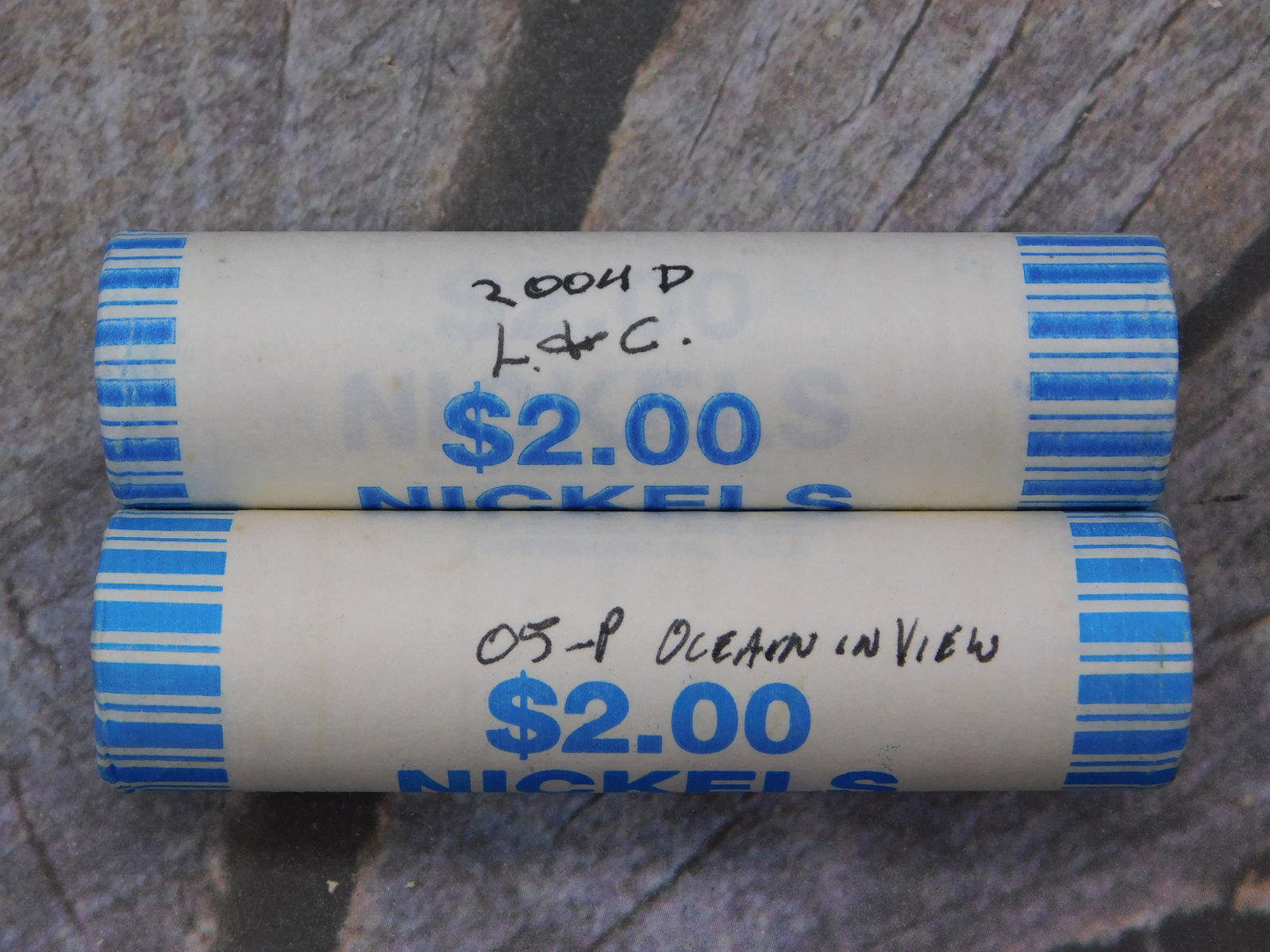 Two Rolls U.S. Nickels 2004D 05P Collector Coins Currency: Two Rolls U.S. Nickels 2004D 05P Collector Coins Currency featuring one 2004-D Denver mint roll and one 2005-P Philadelphia mint roll. Each roll contains $2.00 face value in modern U.S. nickels, profe