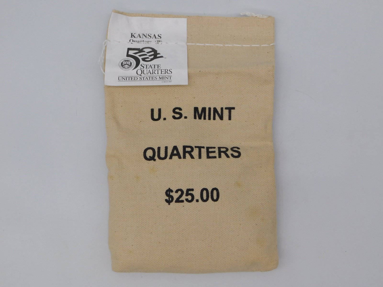 U.S. Mint Kansas State Quarters $25 Face Value Sealed Bag Collectible: U.S. Mint Kansas State Quarters $25 Face Value Sealed Bag Collectible represents an authentic piece of the 50 State Quarters Program, one of the most popular modern numismatic initiatives. This offici