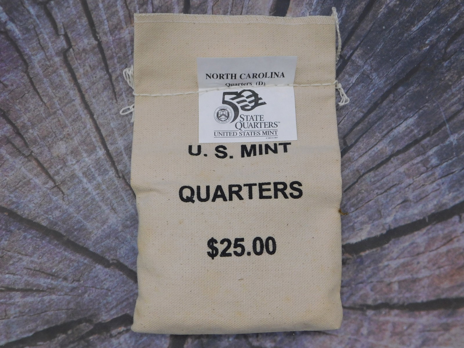 North Carolina State Quarters D Mint Mark Official U.S. Mint Unopened Sealed Bag Collectible Coins: North Carolina State Quarters D Mint Mark Official U.S. Mint Unopened Sealed Bag Collectible Coins represents a complete, original canvas collection bag from the United States Mint State Quarters prog
