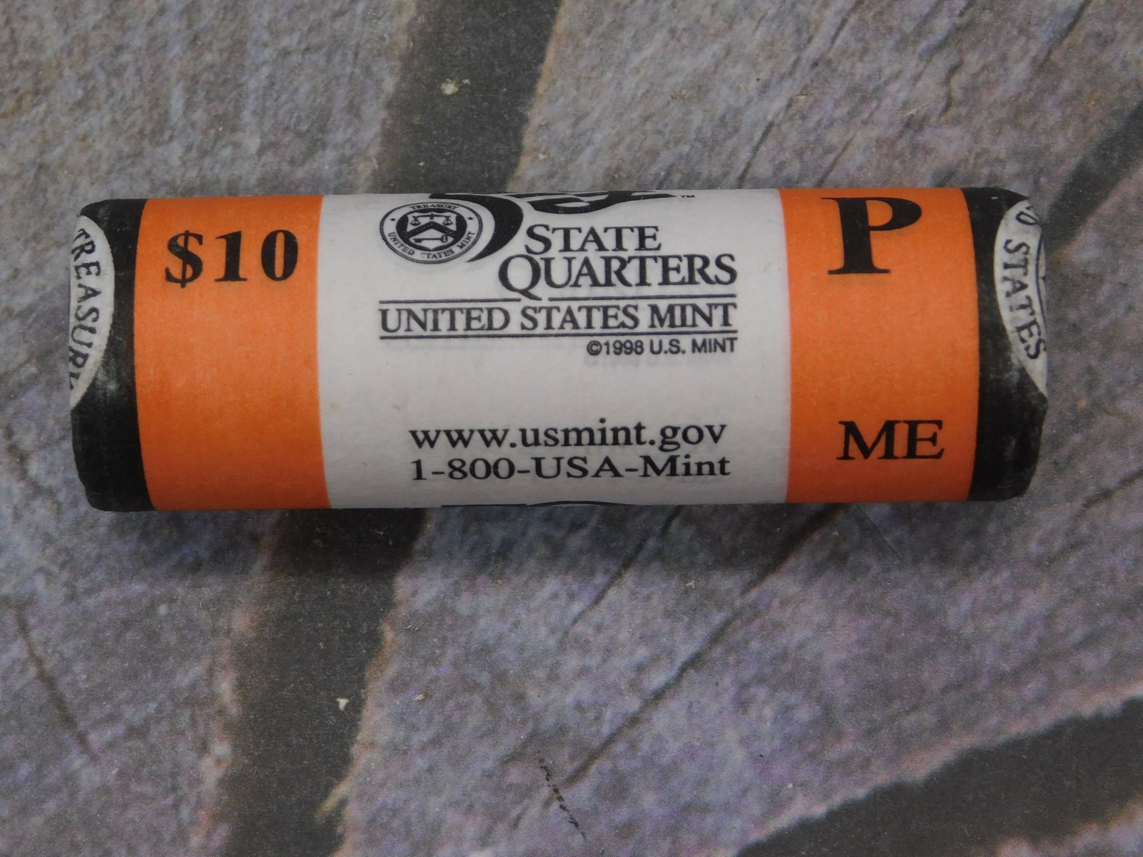 Official U.S. Mint State Quarters Roll Philadelphia Mint Mark P $10 Face Value Collectible: Official U.S. Mint State Quarters Roll Philadelphia Mint Mark P $10 Face Value Collectible Numismatic. This sealed original roll features the iconic orange and black paper wrapper characteristic of th