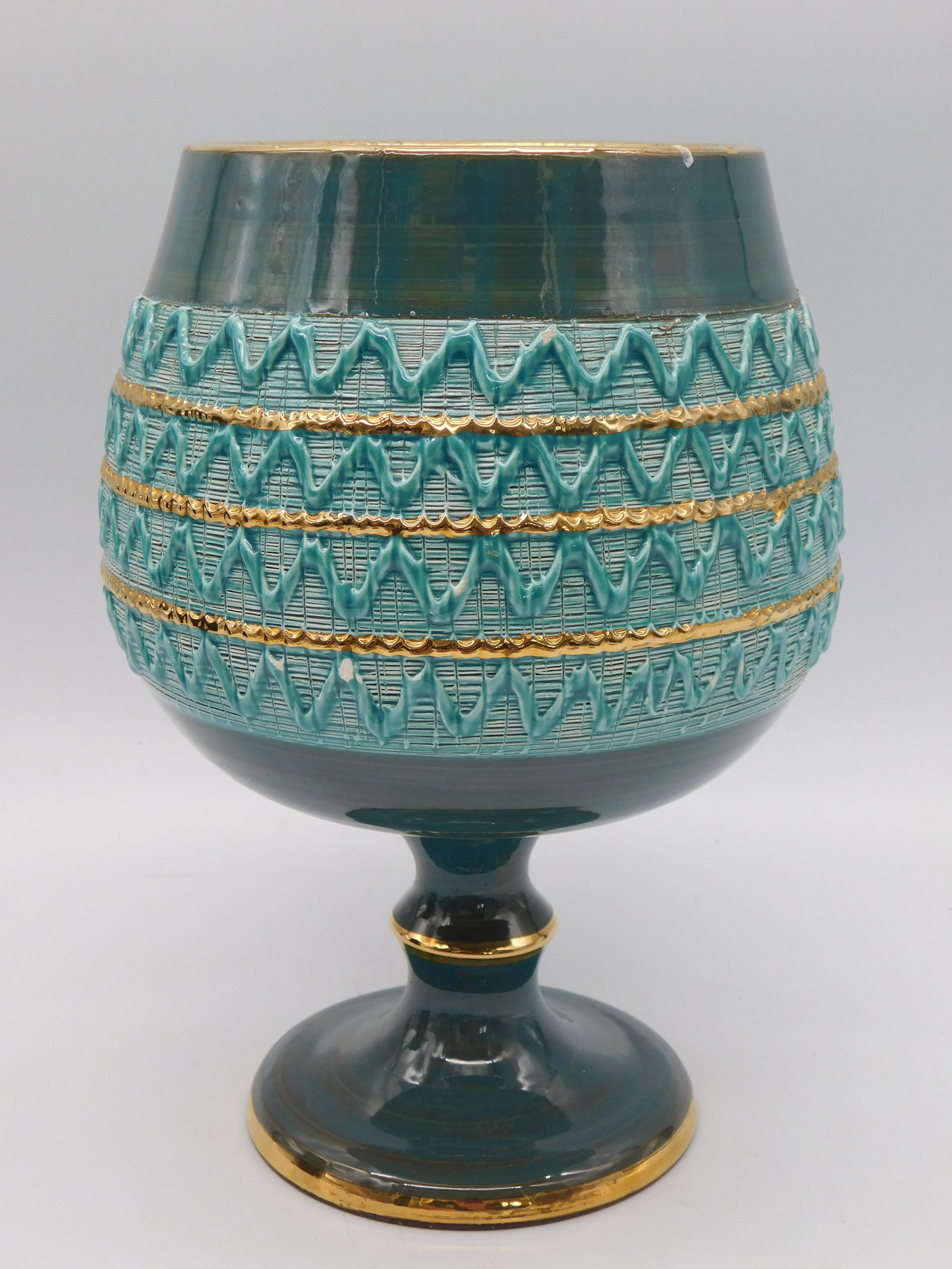 Vintage MCM Antique Teal Ceramic Decorative Vessel Gold Metal Bands Collectible: Vintage Antique Teal Ceramic Decorative Vessel Gold Metal Bands Collectible represents fine mid-century artisan craftsmanship with its striking teal spherical form and geometric relief detailing. This