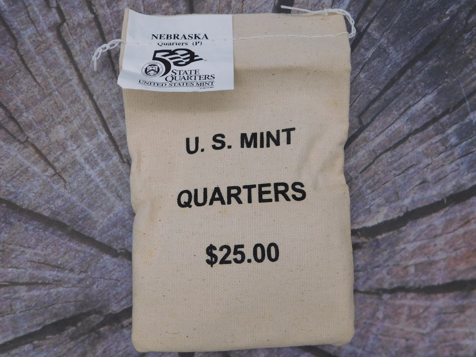 Nebraska State Quarters P Mint Mark Official U.S. Mint Sealed Bag Collectible: Nebraska State Quarters P Mint Mark Official U.S. Mint Sealed Bag Collectible contains $25.00 face value of genuine United States circulating quarters from the iconic 50 State Quarters Program. This