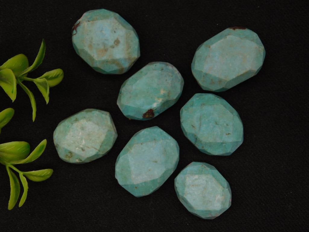 Lot of Seven Faceted Blue Turquoise Stones: Lot of Seven Faceted Blue Turquoise Stones