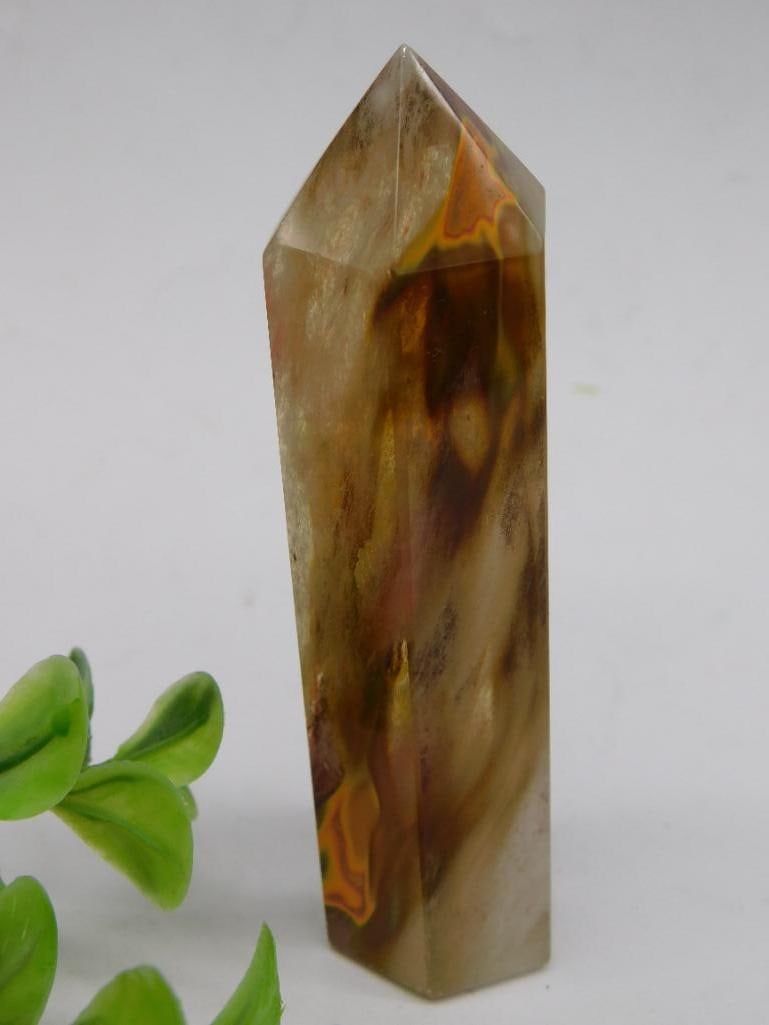 Polished Crystal Point With Earthy Hues: Polished Crystal Point With Earthy Hues