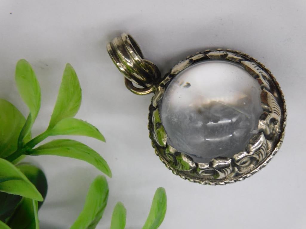 QUARTZ CRYSTAL BALL PENDANT ROCK STONE LAPIDARY SPECIMEN: QUARTZ CRYSTAL BALL PENDANT ROCK STONE LAPIDARY SPECIMEN — Part of our Discover Antique Alley, Crystals and Gems auction at HATMAN'S Auctions! Please see photos for measurements and condition. YES,
