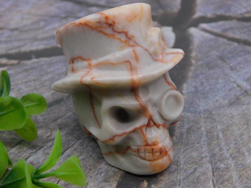 AGATE STEAMPUNK SKULL WITH TOP HAT SCULPTURE ROCK STONE LAPIDARY SPECIMEN: AGATE STEAMPUNK SKULL WITH TOP HAT SCULPTURE ROCK STONE LAPIDARY SPECIMEN — Part of our Discover Antique Alley, Crystals and Gems auction at HATMAN'S Auctions! Please see photos for measurements