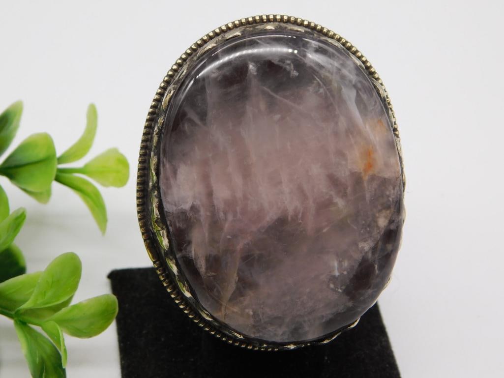 AMETHYST ADJUSTABLE STATEMENT RING ROCK STONE LAPIDARY SPECIMEN: AMETHYST ADJUSTABLE STATEMENT RING ROCK STONE LAPIDARY SPECIMEN — Part of our Discover Antique Alley, Crystals and Gems auction at HATMAN'S Auctions! Please see photos for measurements and