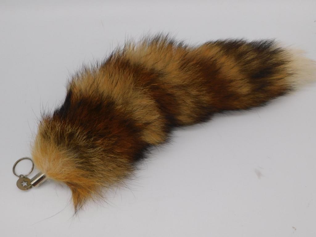 RED FOX TAIL TAXIDERMY ON KEYCHAIN: RED FOX TAIL TAXIDERMY ON KEYCHAIN — Part of our Discover Antique Alley, Crystals and Gems auction at HATMAN'S Auctions! Please see photos for measurements and condition. YES, we have in-house shipp