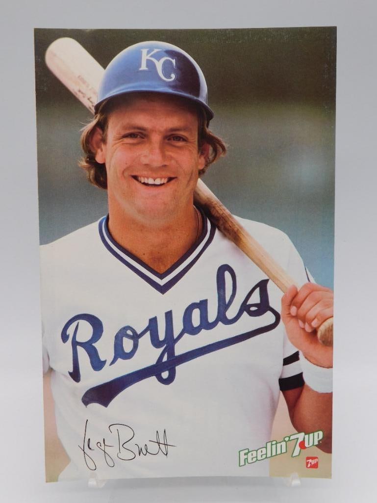 7UP ADVERTISING GEORGE BRETT POSTER: 7UP ADVERTISING GEORGE BRETT POSTER — Part of our Discover Antique Alley, Crystals and Gems auction at HATMAN'S Auctions! Please see photos for measurements and condition. YES, we have in-house ship