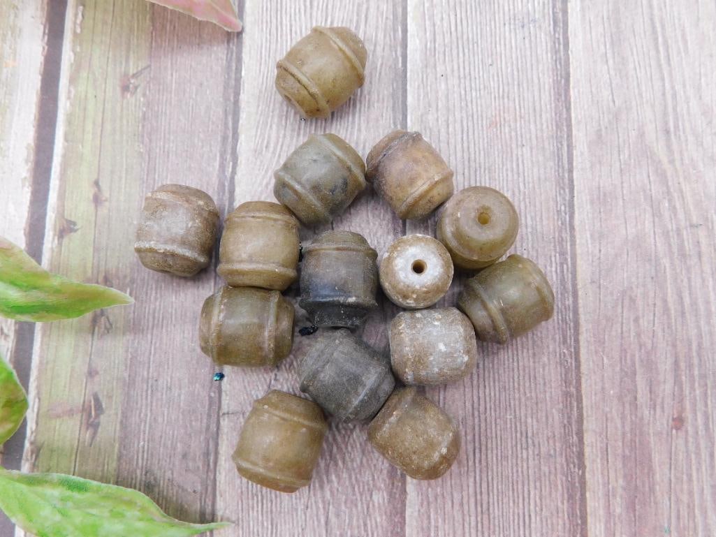 Collection of 12 Barrel-Shaped Beads in Brown Tones: Collection of 12 Barrel-Shaped Beads in Brown Tones