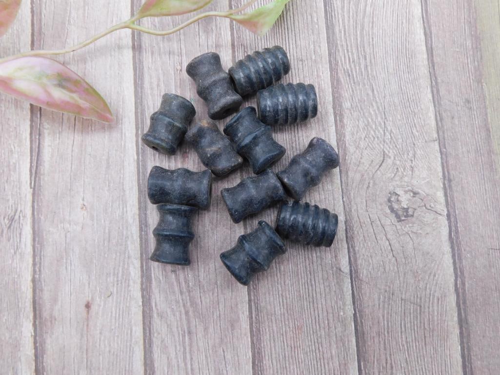 Collection of 12 Black Ribbed Cylindrical Beads: Collection of 12 Black Ribbed Cylindrical Beads