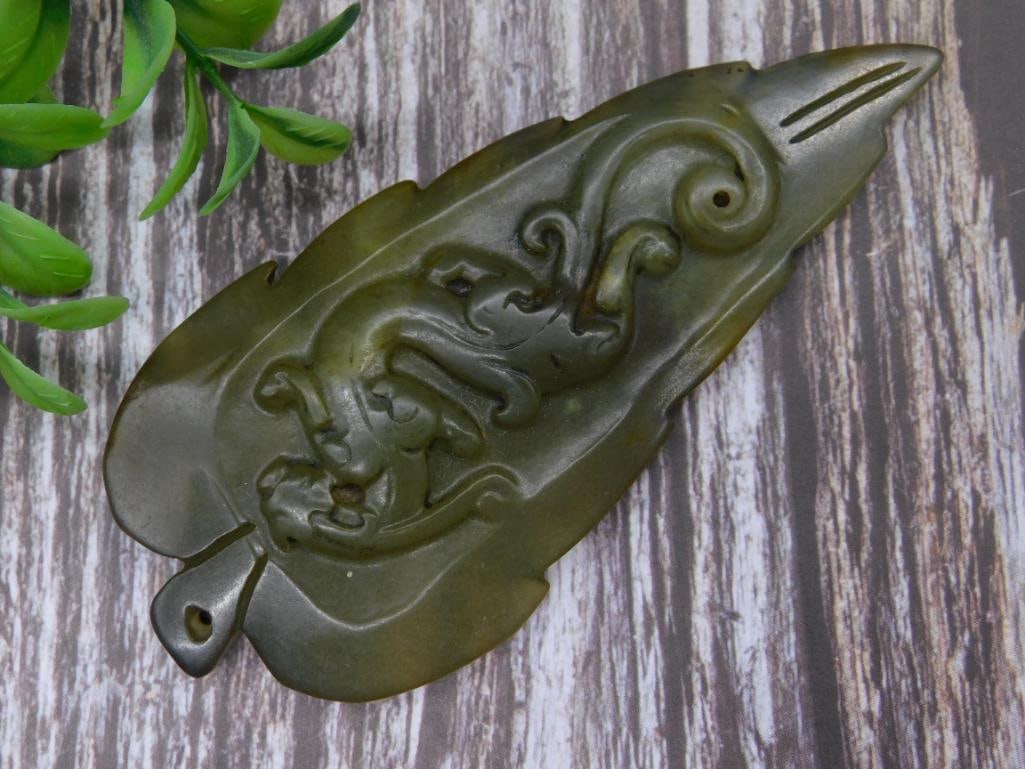 Carved Jade Stone Pendant with Animal Motif: Carved Jade Stone Pendant with Animal Motif
