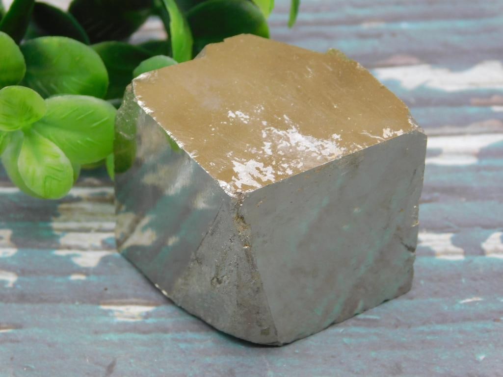 ILLUSTRIOUS SPANISH PYRITE CUBE METALLIC LUSTER MINERAL COLLECTOR PIECE: This pyrite cube specimen offers the natural geometric beauty that mineral and crystal collectors seek out, with a bold golden metallic luster. It's a solid addition to a display shelf or specimen