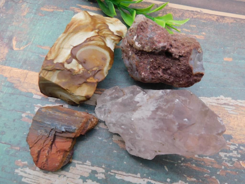 MIXED ROUGH ROCK LAPIDARY STONE LOT - NATURAL RAW SPECIMEN FOR ROCKHOUND COLLECTION: A mixed grouping of rough, natural stone perfect for rockhounds wanting extra cabbing or tumbling material on hand. Each piece offers a different look, making this a versatile addition to any lapidary
