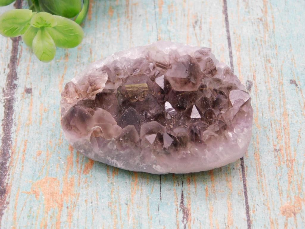 Smoky Amethyst Crystal Geode Specimen: A natural crystal cluster with smoky purple points, shown beside a quarter for scale at roughly 3 inches across. A nice display specimen for rock and crystal collectors. Natural variation in color