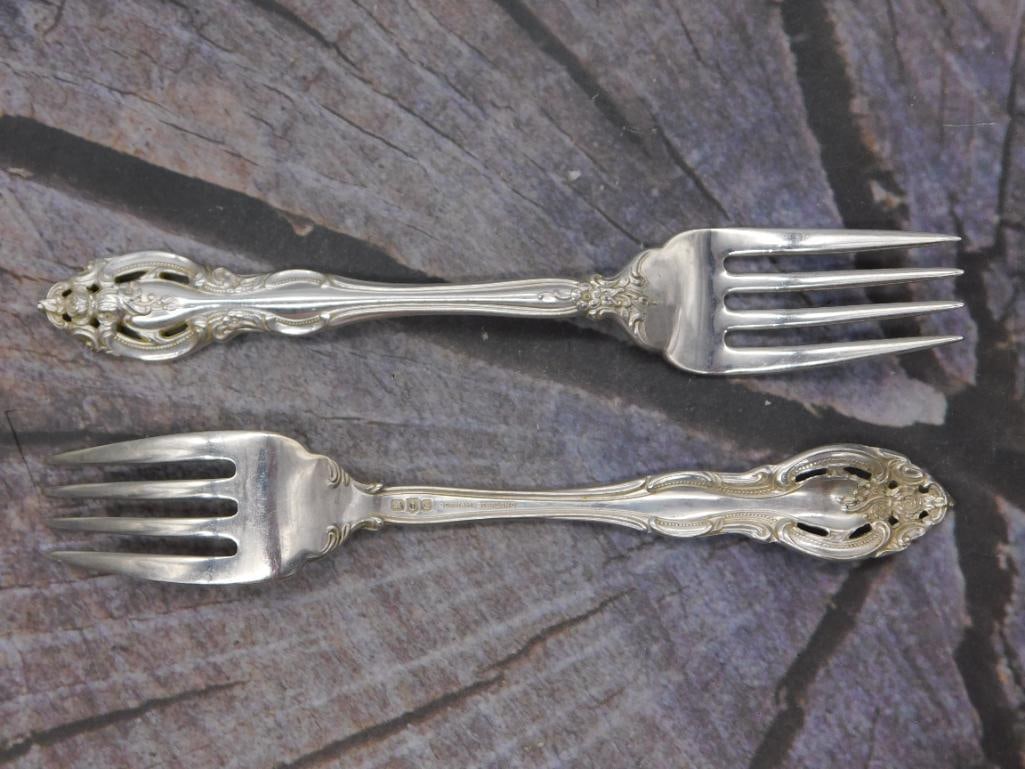 Sterling Silver Dinner Forks — Pair of Gorham Pattern Forks, 7.5 Inches: Two sterling silver dinner forks marked Gorham Sterling in the familiar pierced, scrolled pattern. Each fork measures approximately 7.5 inches long.