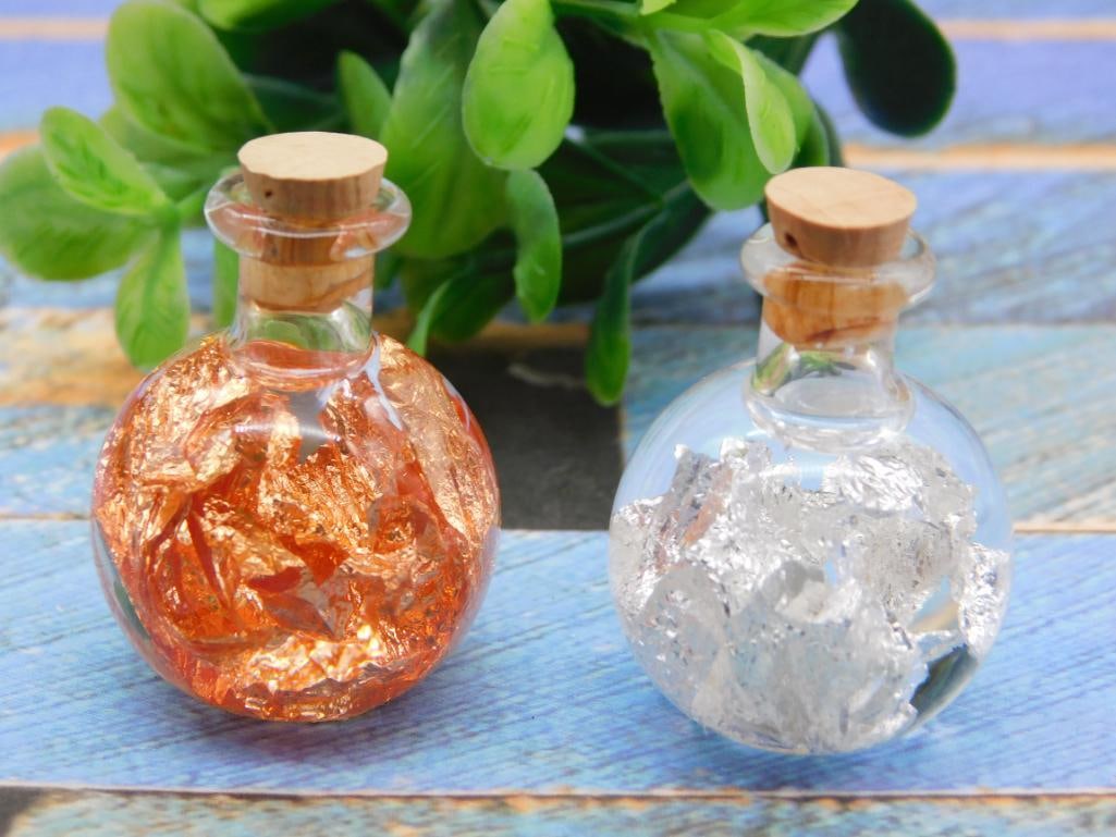 GOLD AND COPPER FLAKES IN BOTTLES ROCK STONE LAPIDARY SPECIMEN: GOLD AND COPPER FLAKES IN BOTTLES ROCK STONE LAPIDARY SPECIMEN — Part of our Discover Buried Treasure, Crystals and Gems auction at HATMAN'S Auctions! Please see photos for measurements and