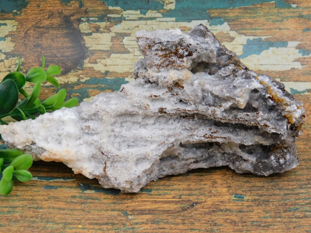 CHALCEDONY NATURAL CRYSTAL MINERAL COLLECTOR DISPLAY SPECIMEN: This chalcedony specimen offers the smooth, waxy luster collectors and mineral enthusiasts look for, making it a nice addition to a display collection. See photos for exact size and condition.