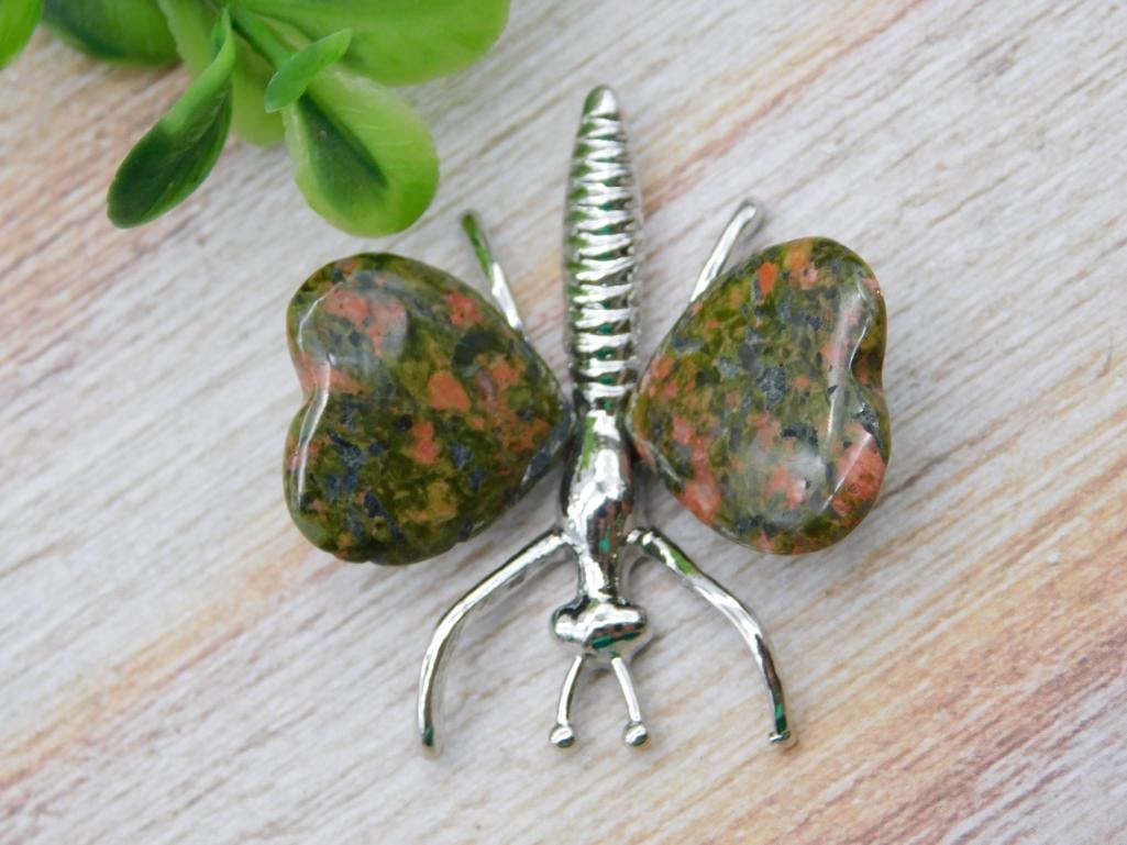 STONE BUTTERFLY NATURAL CARVED STONE COLLECTIBLE FOR DISPLAY: This stone butterfly is carved from natural stone, making a charming display piece or shelf accent. A nice find for collectors of stone carvings, nature lovers, and gift-givers. See photos for exact
