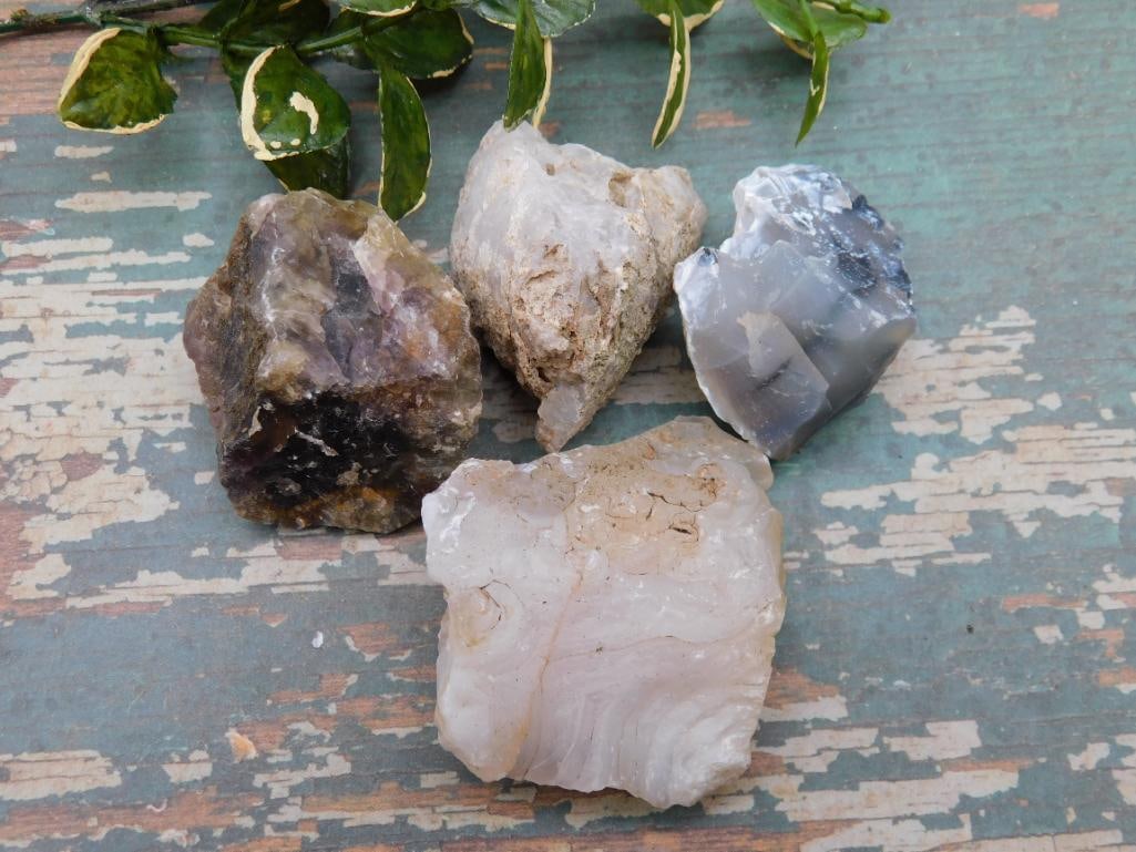 MIXED ROUGH ROCK ROCK STONE LAPIDARY SPECIMEN COLLECTOR GRADE ROUGH ASSORTMENT: Collectors will enjoy this rough rock assortment, gathered together for those who appreciate stone in its natural, unpolished state. It's a solid addition to any mineral collection or lapidary stash. 