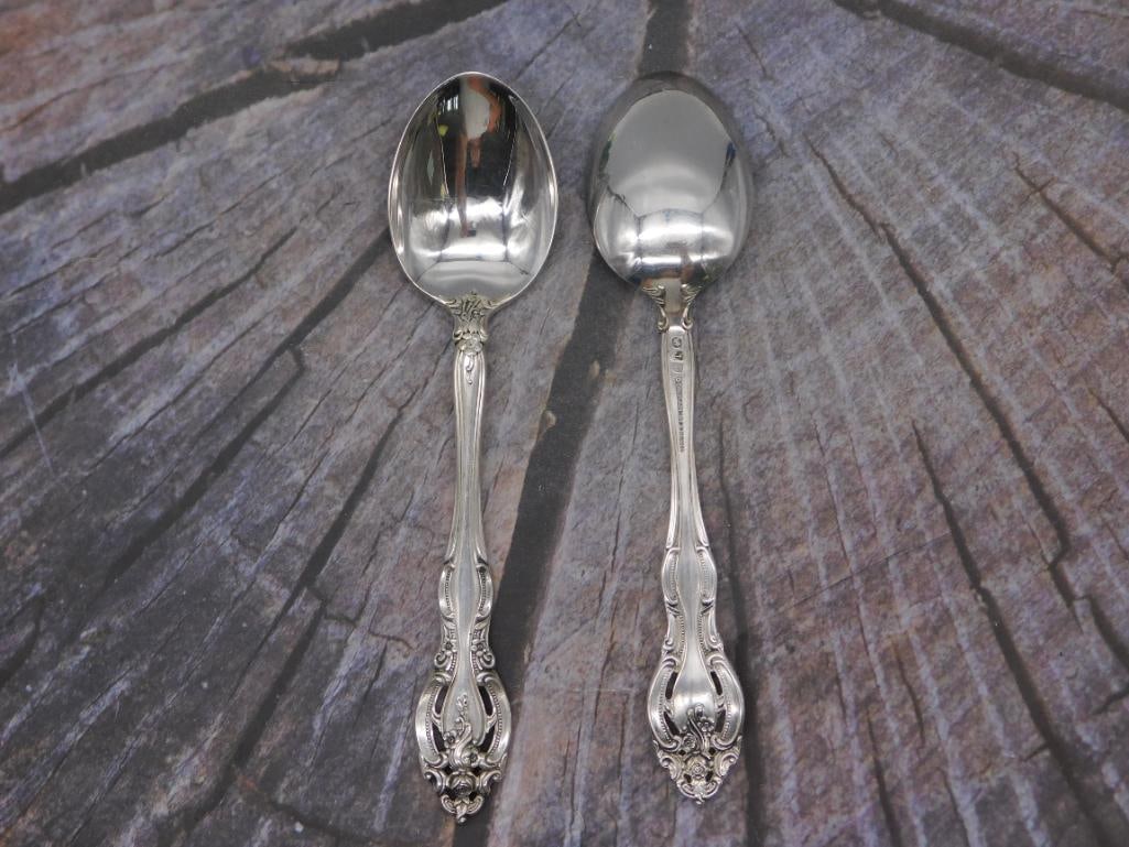 Sterling Silver — Pair of Gorham Sterling Tablespoons, Approx. 6 Inches: Offered here are two matching sterling silver tablespoons marked "Gorham Sterling" on the handle, each approximately 6 inches long. The spoons have an oval bowl and a decorative scrolled handle with a