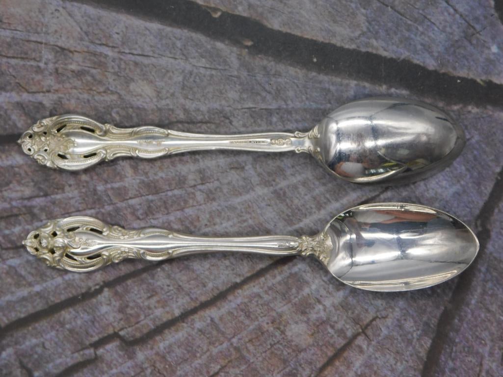 Sterling Silver Teaspoons — Pair of Gorham Pattern Spoons, 6.75 Inches: Two sterling silver teaspoons marked Gorham Sterling, matching the ornate pierced pattern seen throughout this collection. Each spoon measures approximately 6.75 inches long. Bowls show light wear wit