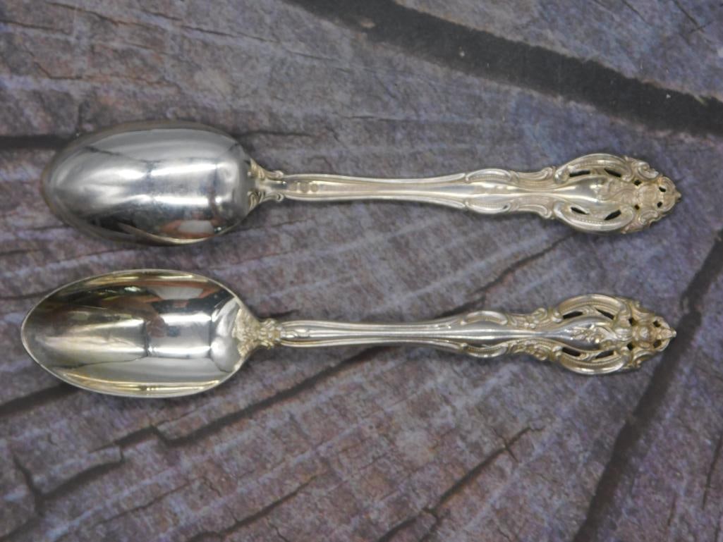 Sterling Silver Teaspoons — Pair of Gorham Pattern Spoons, 6.75 Inches: Two sterling silver teaspoons marked Gorham Sterling, in the same pierced, scrolled pattern as the rest of this collection. Each spoon measures approximately 6.75 inches long. A clean, matched pair in