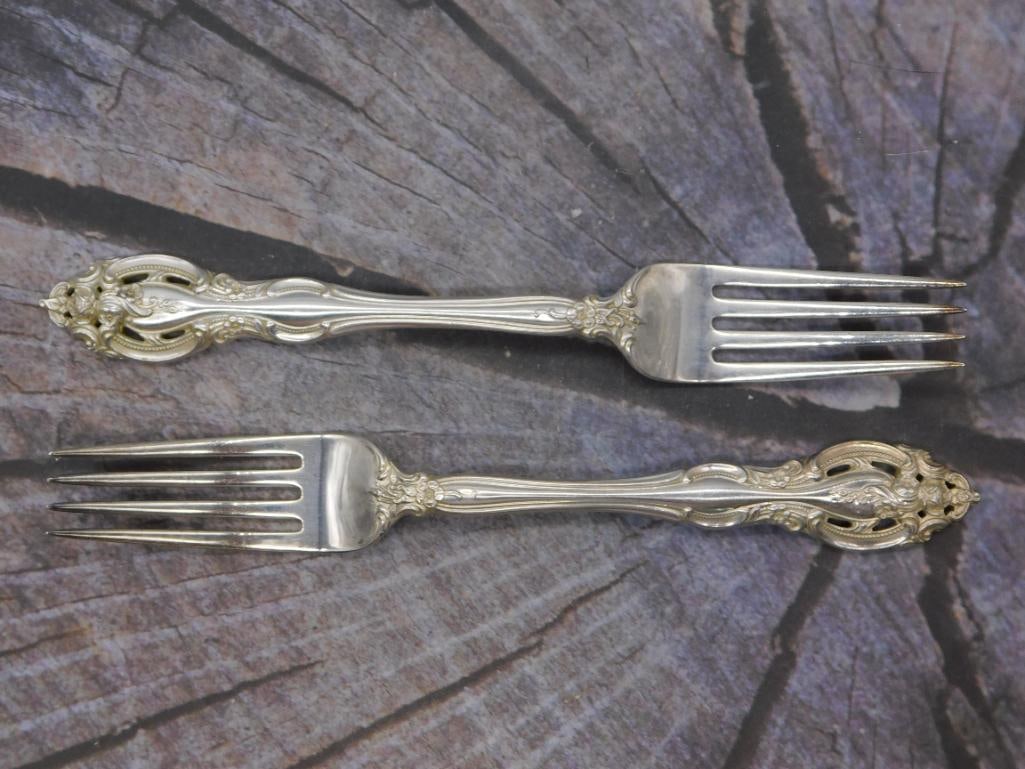 Sterling Silver Dinner Forks — Pair of Gorham Pattern Forks, 7.5 Inches: Two sterling silver dinner forks marked Gorham Sterling in the familiar pierced pattern. Each fork measures approximately 7.5 inches long. A clean matching pair.