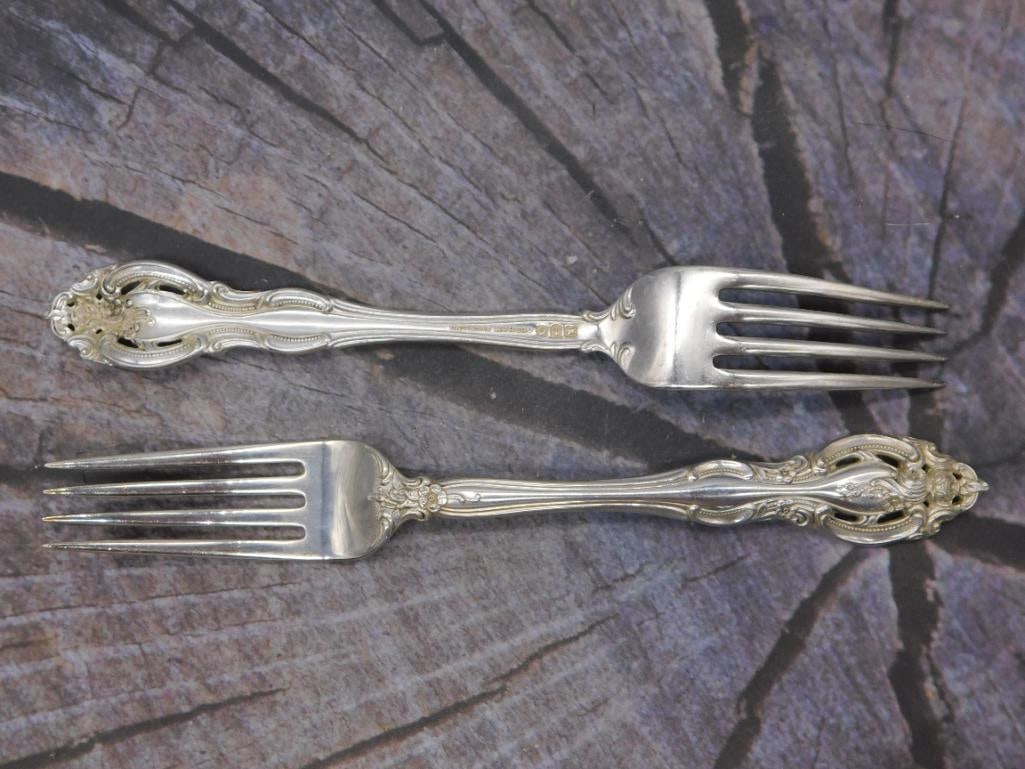 Sterling Silver Dinner Forks — Pair of Gorham Pattern Forks, 7.5 Inches: Two sterling silver dinner forks marked Gorham Sterling, matching the ornate pattern seen throughout this auction. Each fork measures approximately 7.5 inches long.