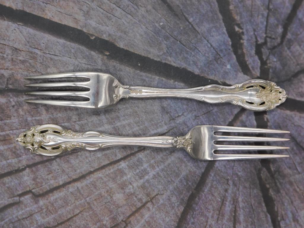 Sterling Silver Dinner Forks — Pair of Gorham Pattern Forks, 7.5 Inches: Two sterling silver dinner forks marked Gorham Sterling in the same pierced, scrolled pattern. Each fork measures approximately 7.5 inches long, with light overall tarnish.