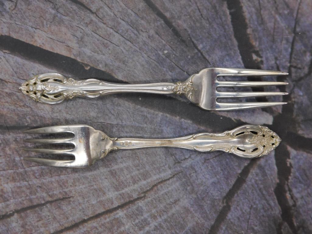 Sterling Silver Dinner Forks — Pair of Gorham Pattern Forks, 7.5 Inches: Two sterling silver dinner forks marked Gorham Sterling in the familiar pierced, scrolled pattern. Each fork measures approximately 7.5 inches long.
