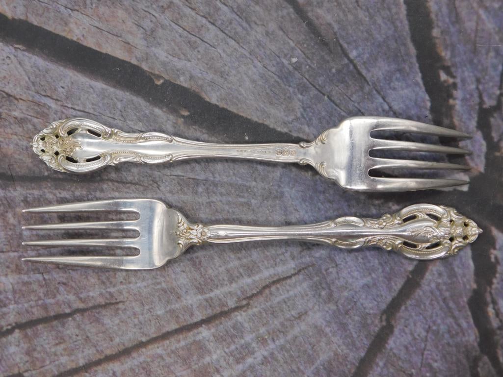 Sterling Silver Dinner Forks — Pair of Gorham Pattern Forks, 7.5 Inches: Two sterling silver dinner forks marked Gorham Sterling, matching the ornate pattern seen elsewhere in this auction. Each fork measures approximately 7.5 inches long.