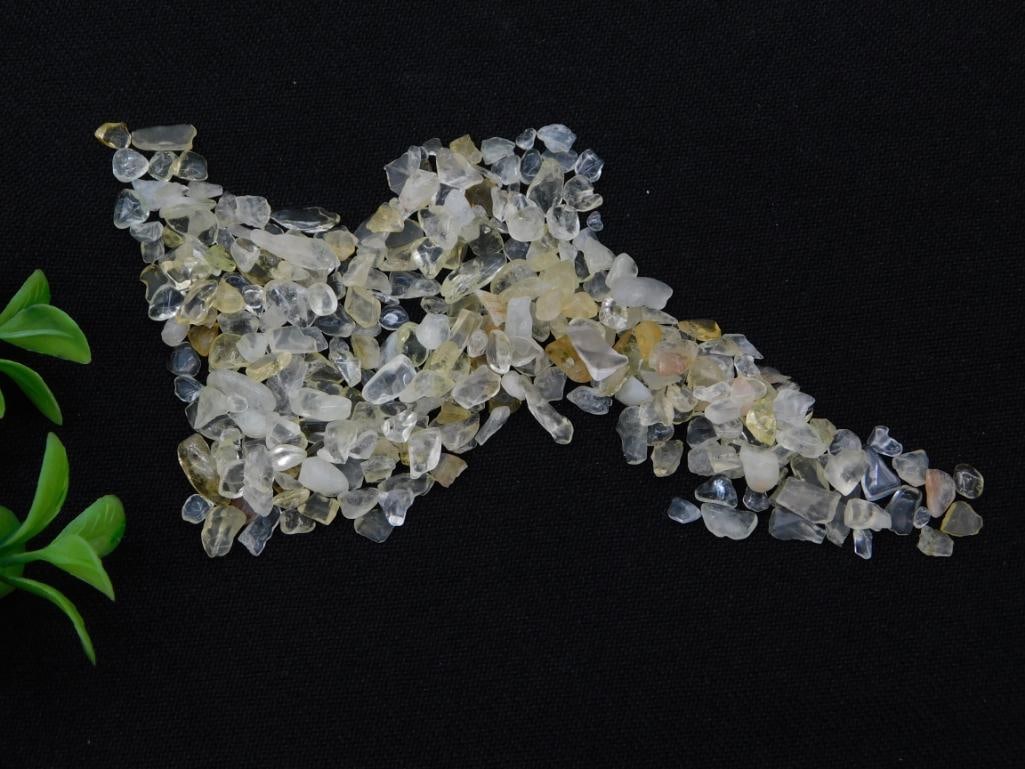 Natural Citrine Crystal Chips, 20 Grams: Bag of small tumbled/rough citrine quartz crystal chips in pale yellow and clear tones, totaling 20 grams as labeled. Craft or jewelry-making grade natural gemstone material, shown beside a quarter