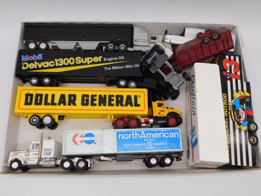 Die-Cast Semi Truck & Trailer Toy Lot, Mobil Dollar General: Group of die-cast tractor-trailer toys including a Mobil Delvac 1300 Super tanker, a yellow Dollar General trailer, a North American Van Lines box trailer, plus a boxed Hamburglar Hot Rod pull-back to