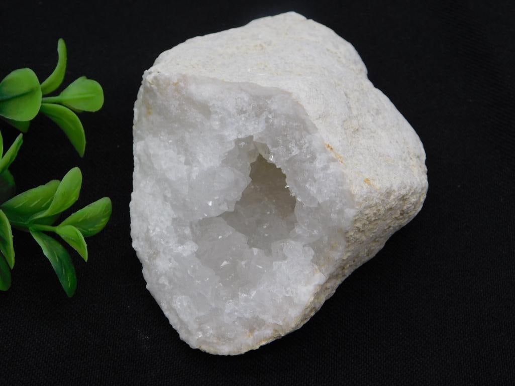 Crystal Quartz Geode Specimen: A large white quartz geode with a jagged crystalline cavity of clear-to-white druzy crystals. 257 grams.
